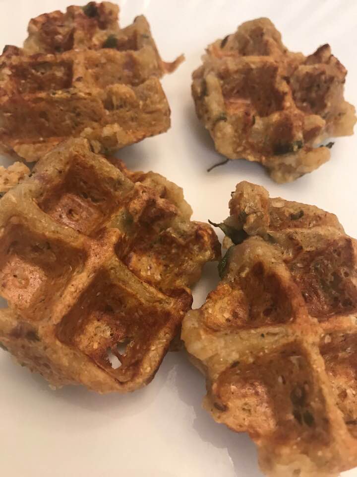 4 pieces of brown waffles spiced with herbs